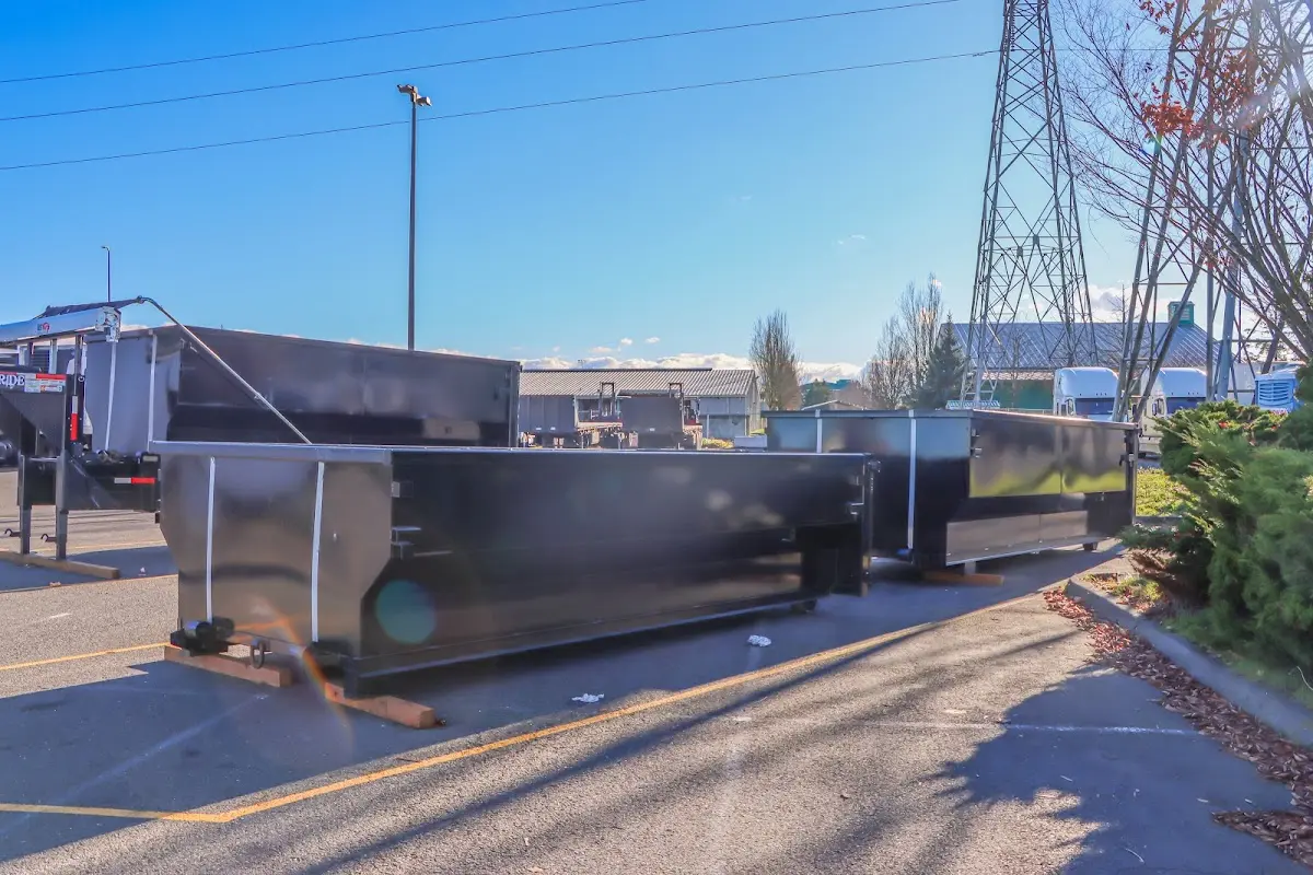 Roll-off dumpster ready for waste disposal at job site for 40 Yard Dumpster Rental in Pinecrest